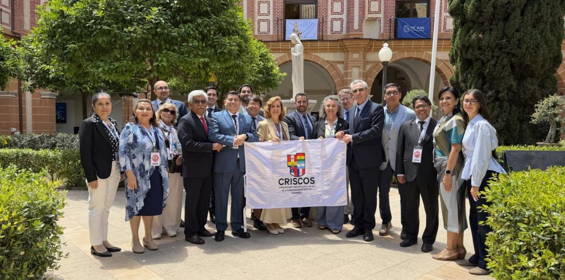 Delegados de CRISCOS junto a representantes de la UCAM