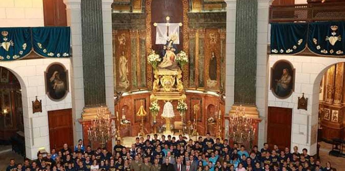 Más de 350 deportistas cartageneros de la UCAM, en la ofrenda floral a La Caridad